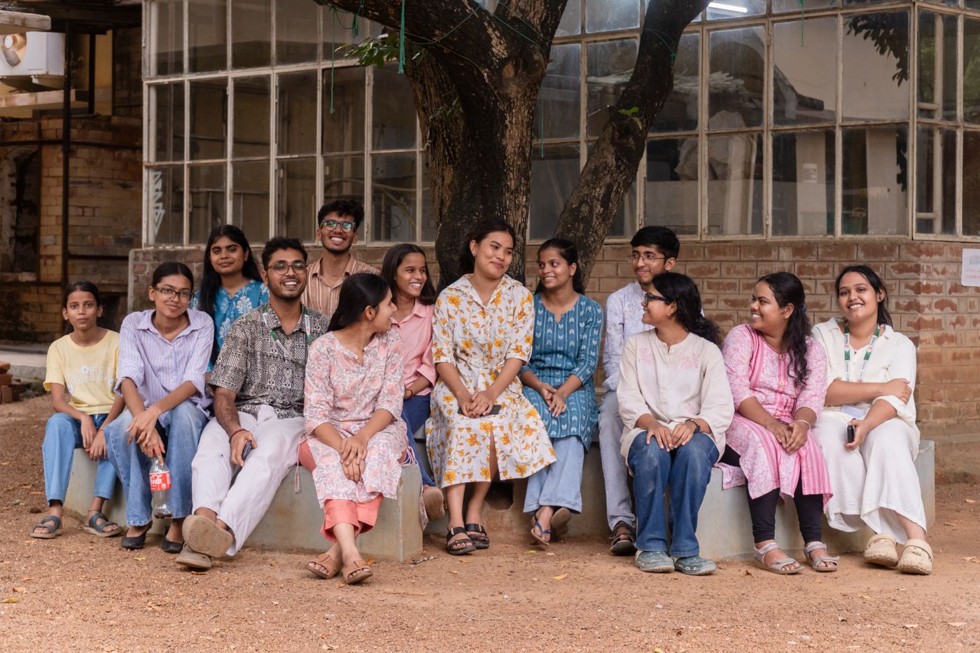 Group of university students gathered on campus during a campus branding program