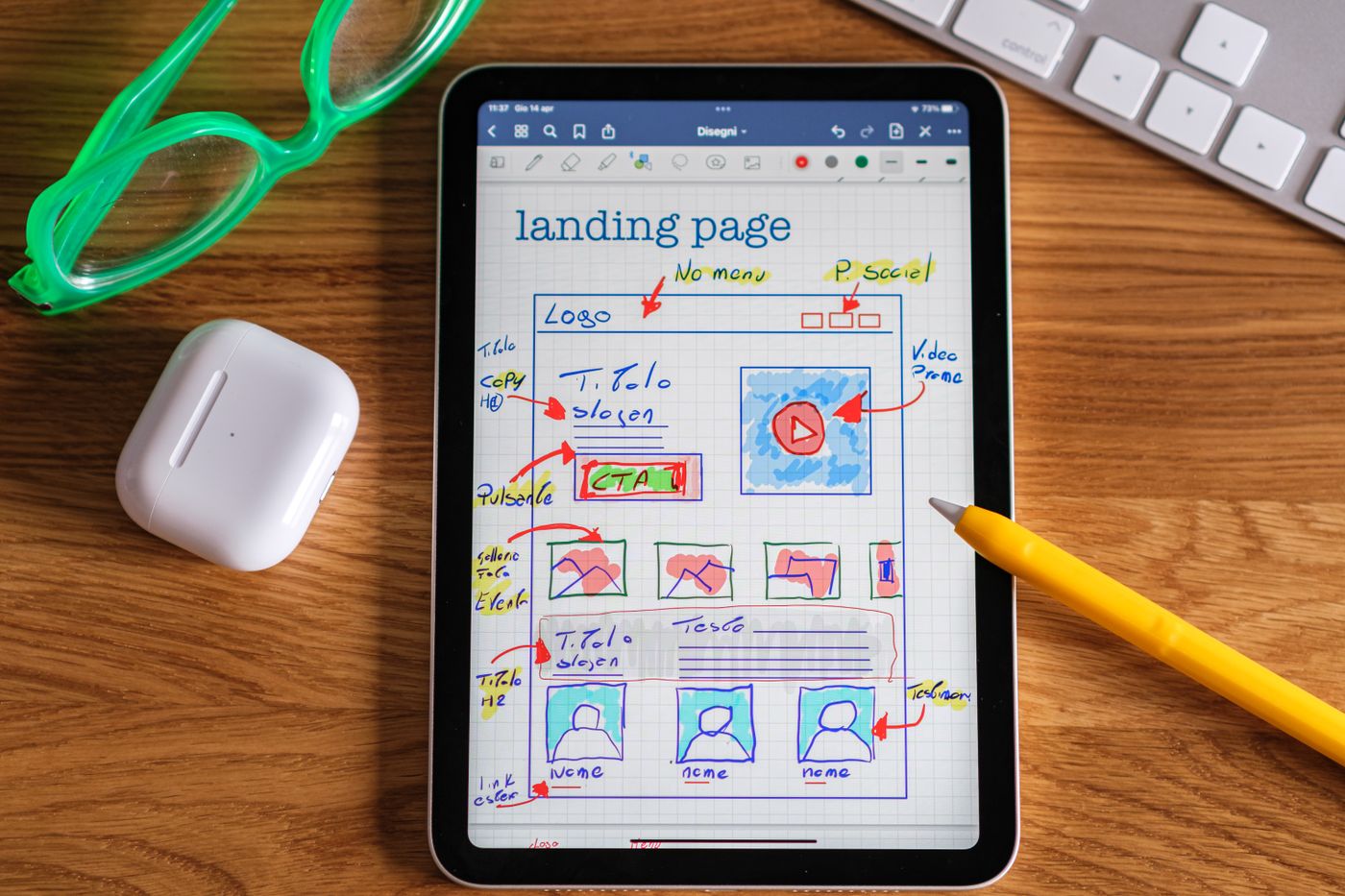 Tablet showing a sketched landing page with its call to action
