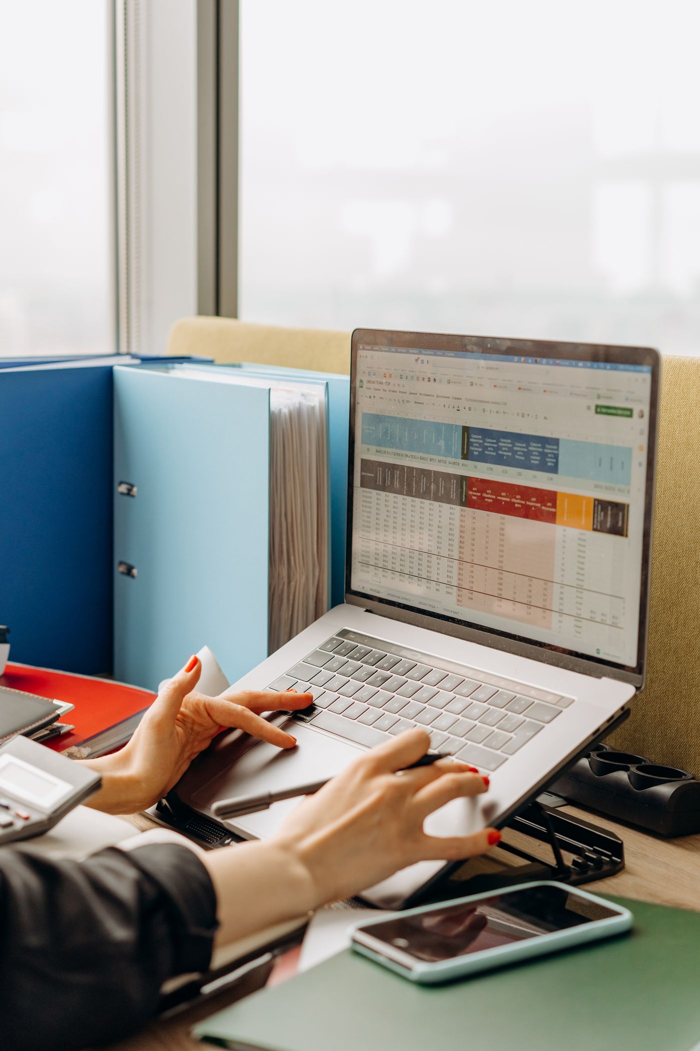 Enriched prospect spreadsheet open on a laptop
