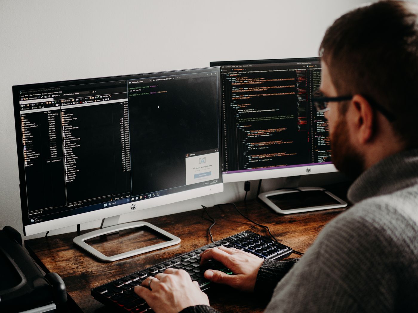 Developer building automation across two monitors