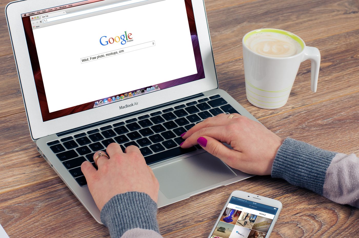 Marketer researching search keywords on a laptop