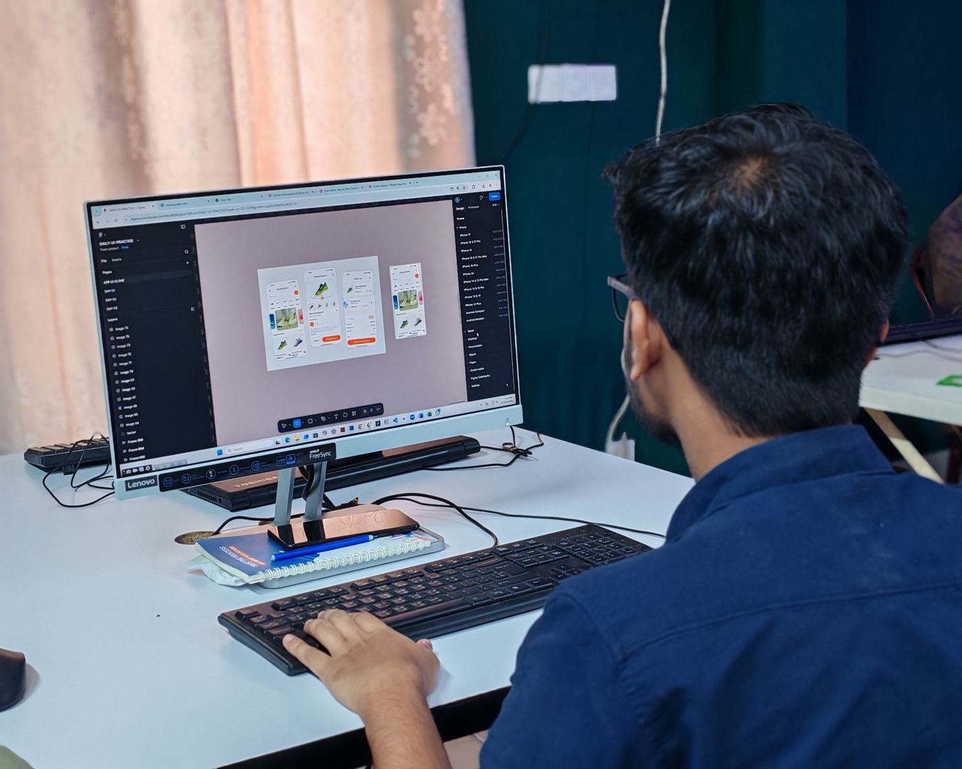 Designer auditing a landing page on his desktop