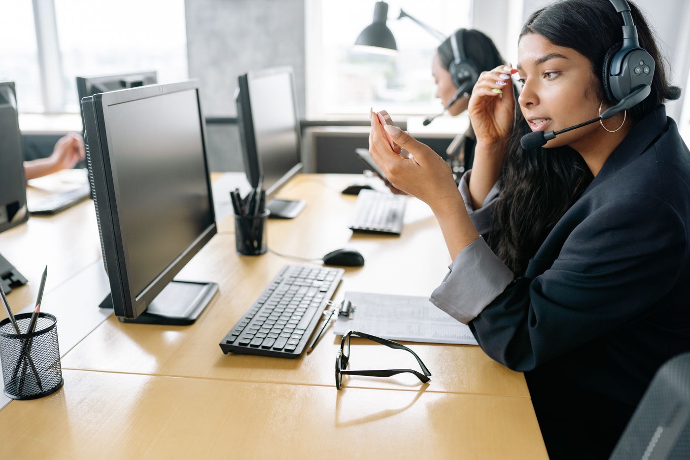 Sales development rep qualifying a lead on a headset call