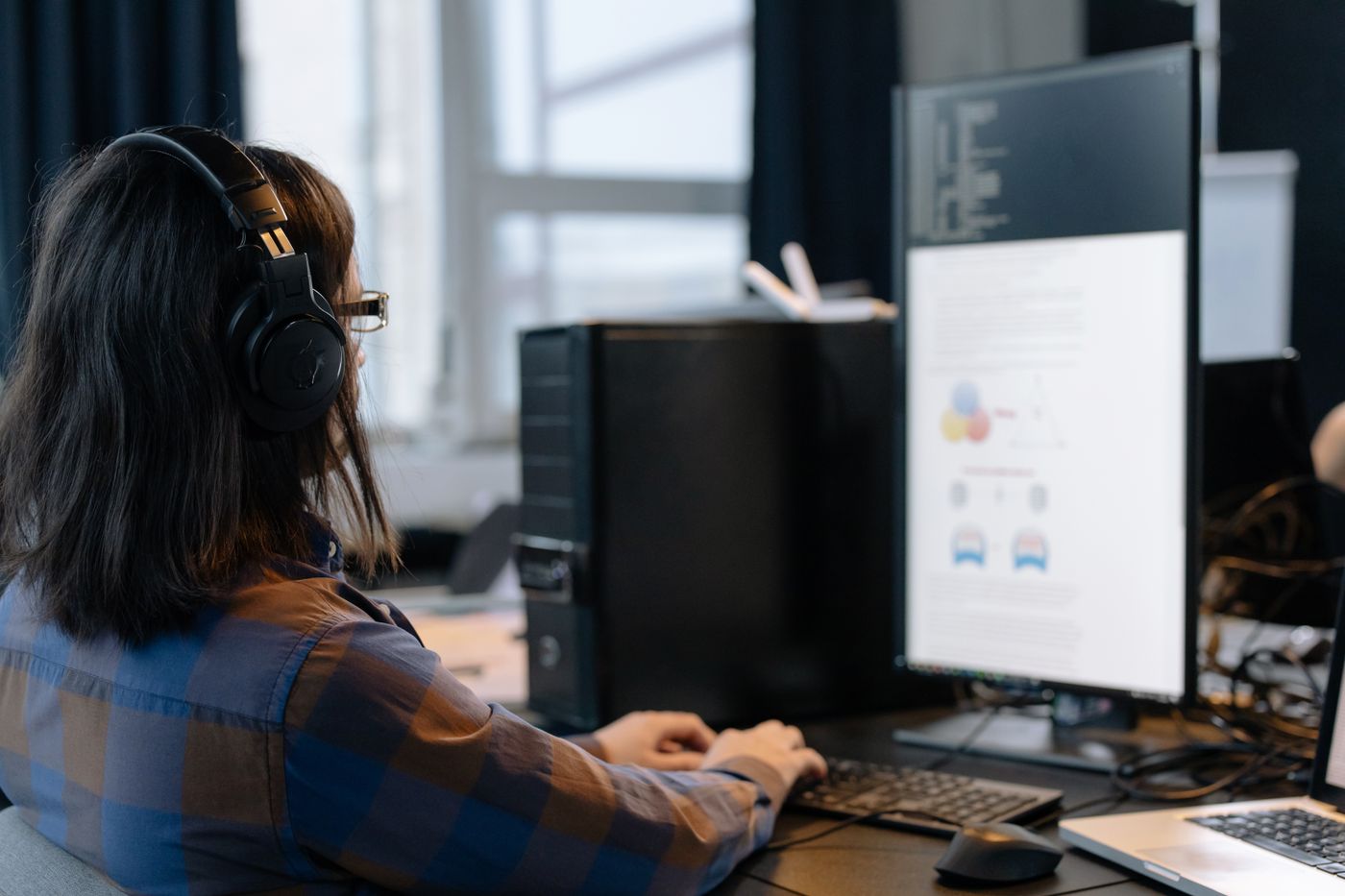 Engineer modernizing a legacy integration at his desk