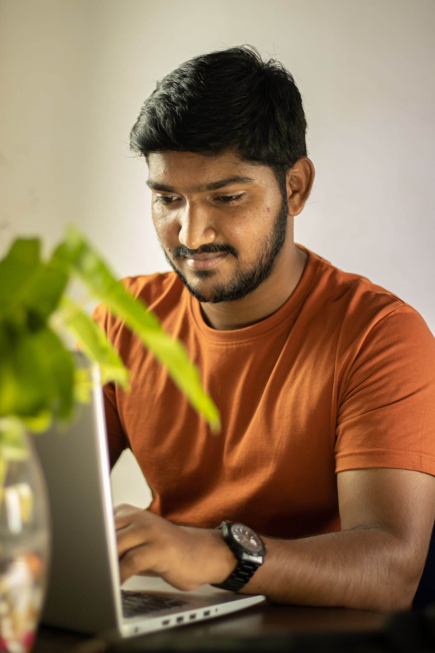 Sales rep preparing personalized outreach on a laptop