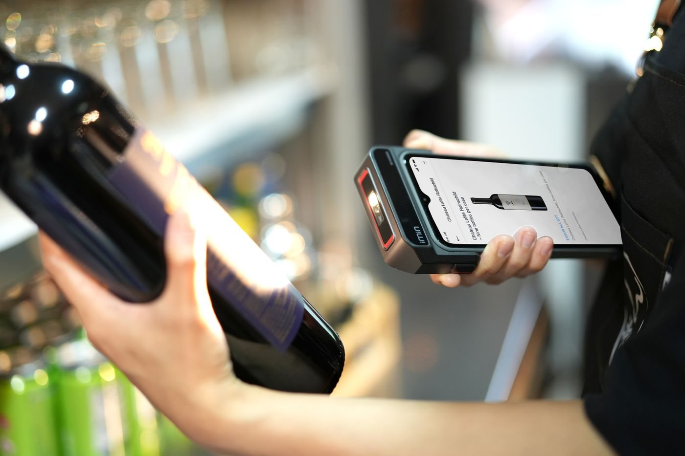 Handheld scanner reading goods into a connected system