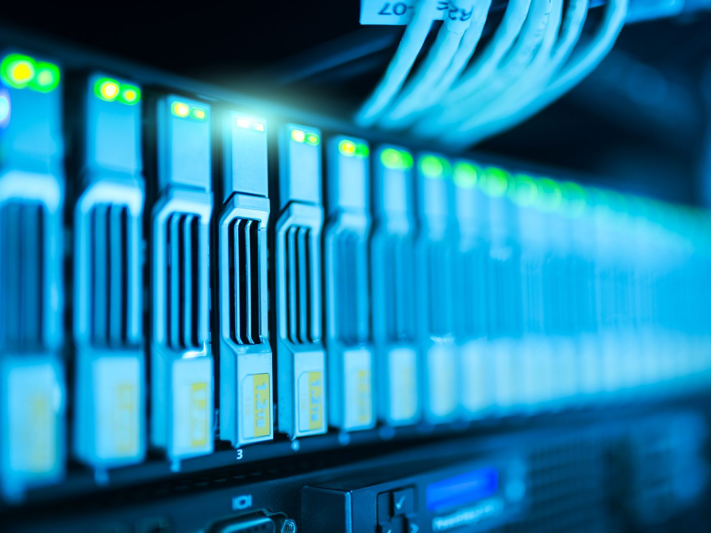 Close-up of server hardware with blue indicator lights