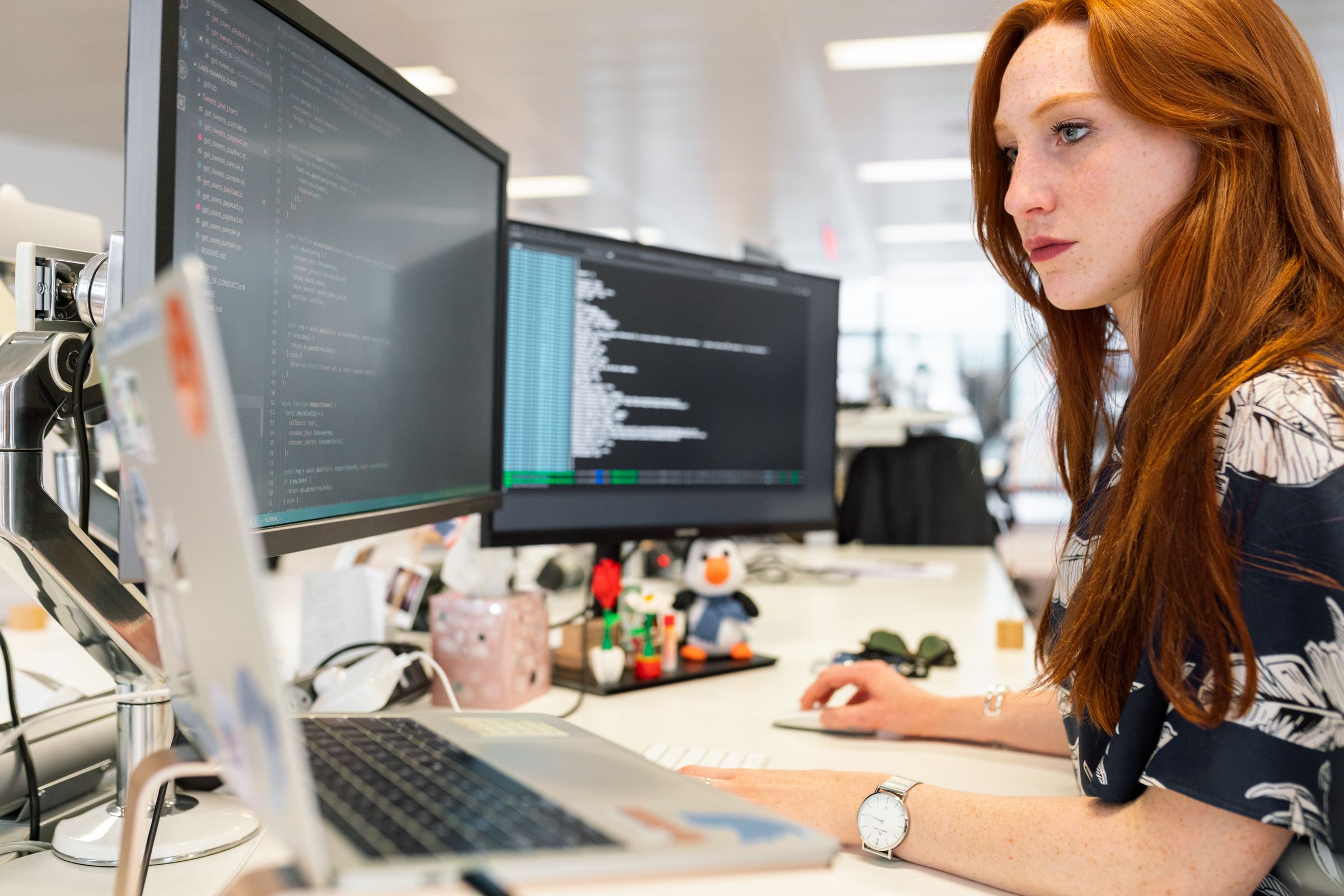Engineer building integrations across multiple monitors