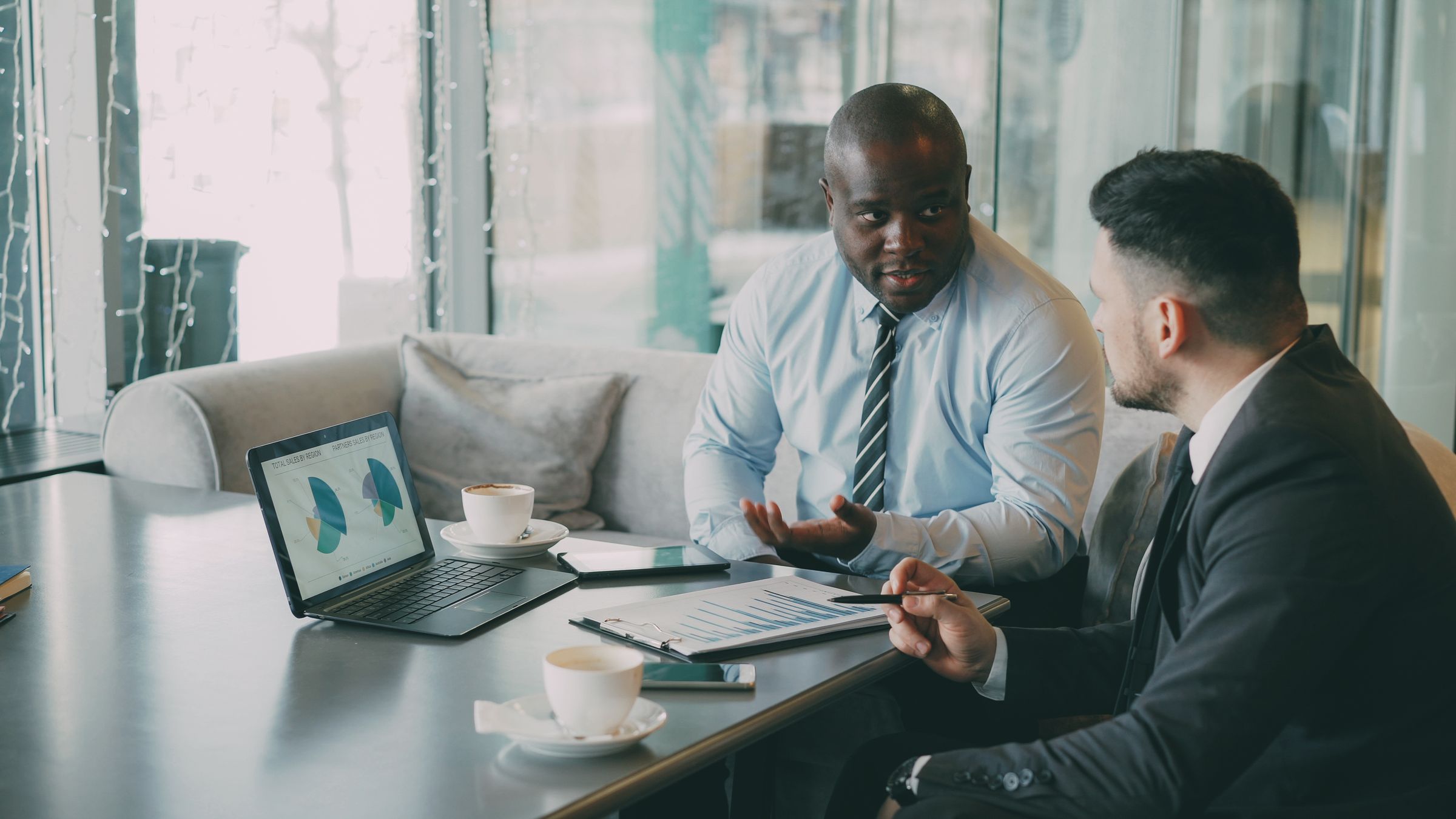 Sales team reviewing their pipeline on a laptop