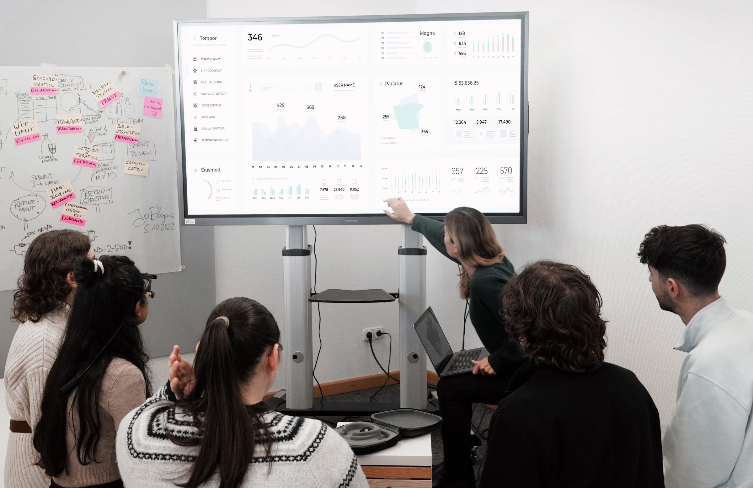 Team walking through a workflow dashboard together