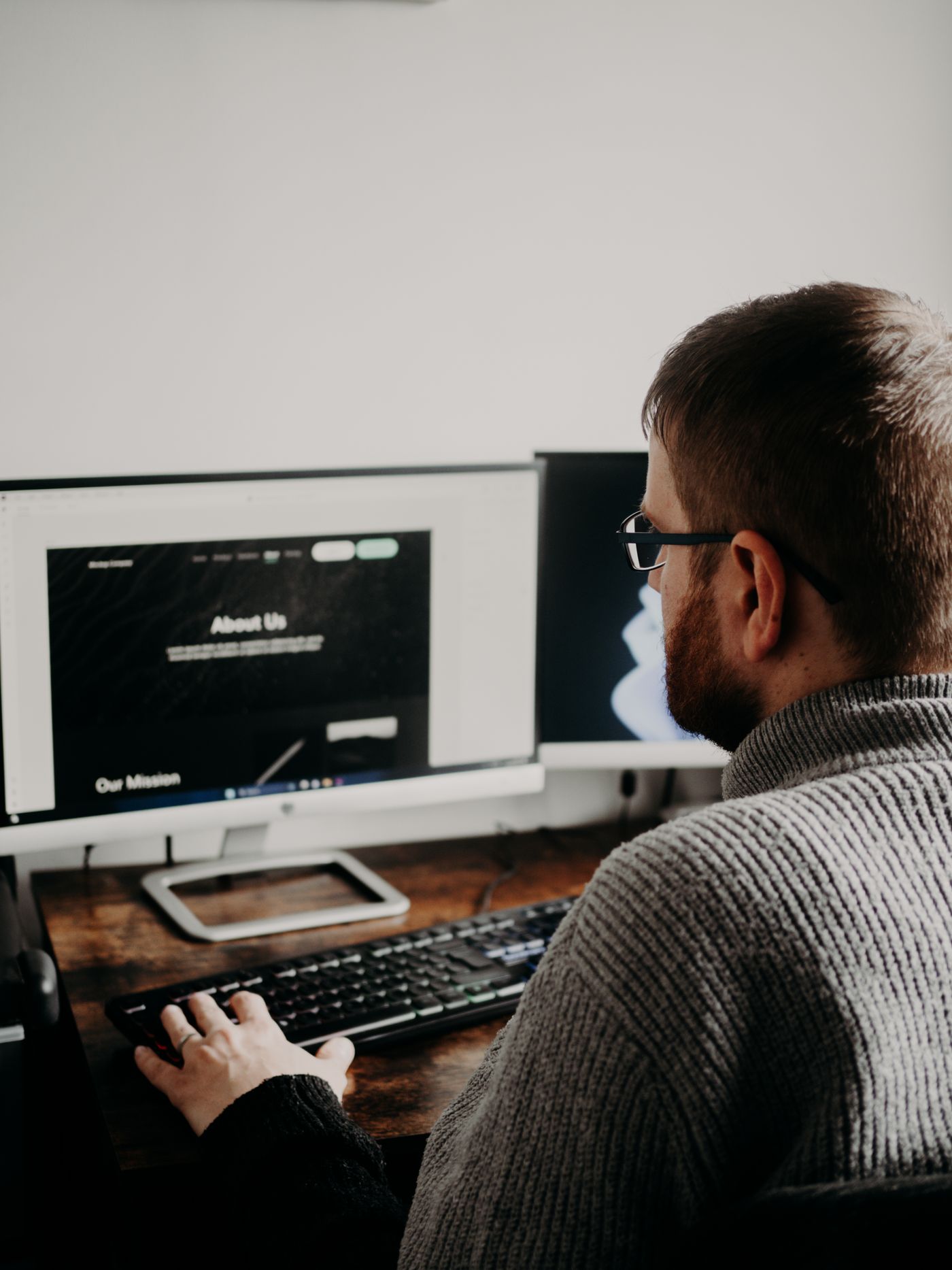 Engineer building AI-powered workflows at his desk