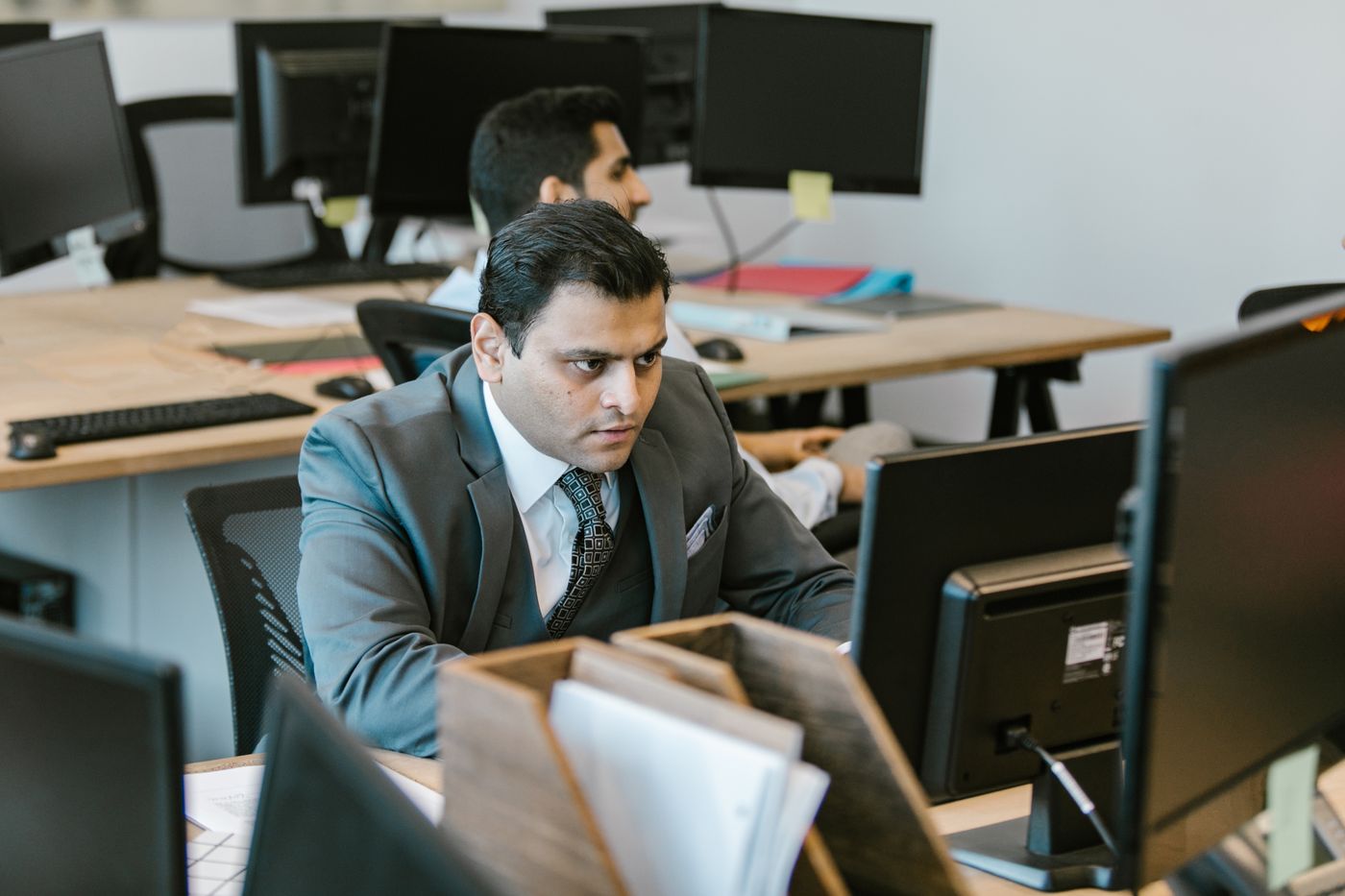 Sales operations lead managing the pipeline at his desk