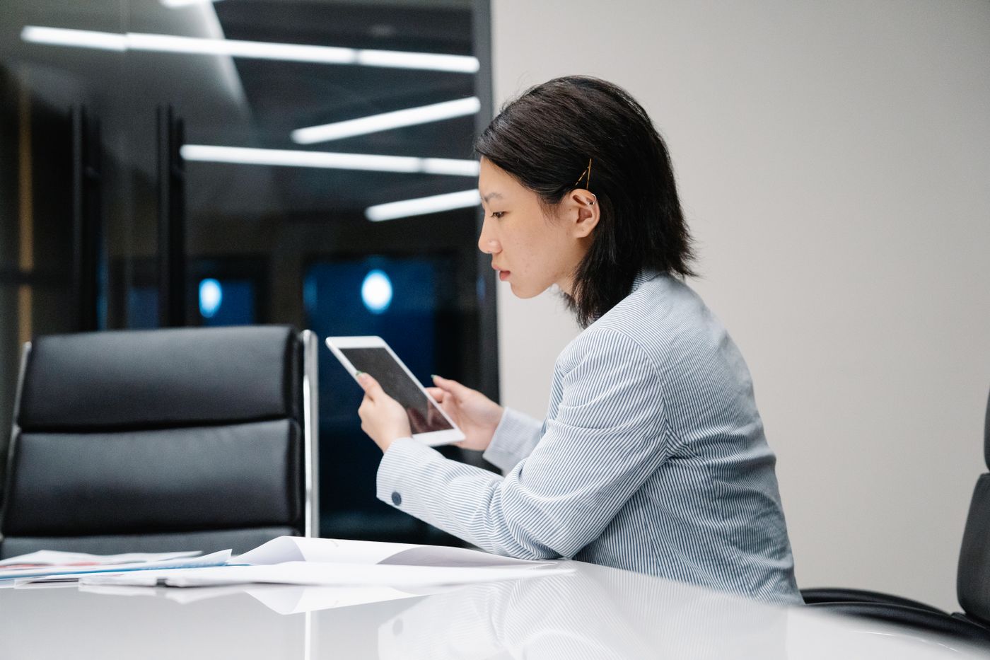 Professional working in an app on a tablet