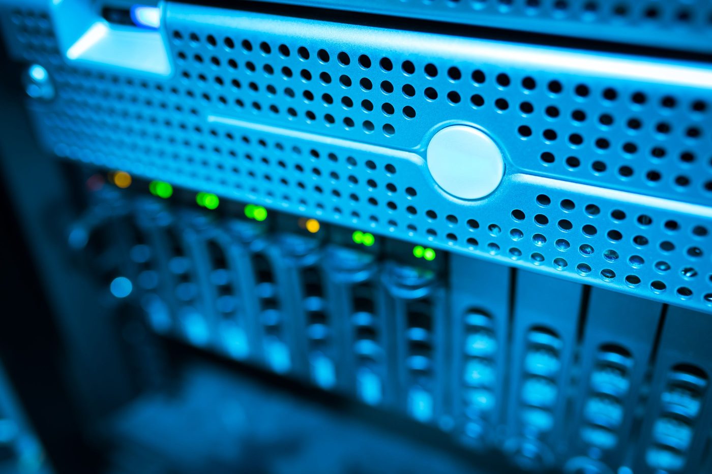Close-up of a rack-mounted server with blue status lights