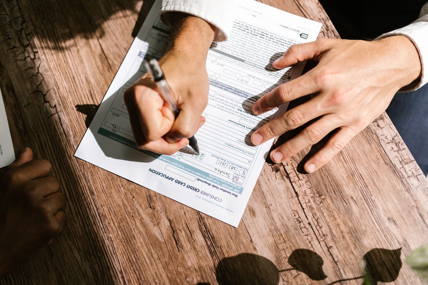 Applicant filling in a credit application form