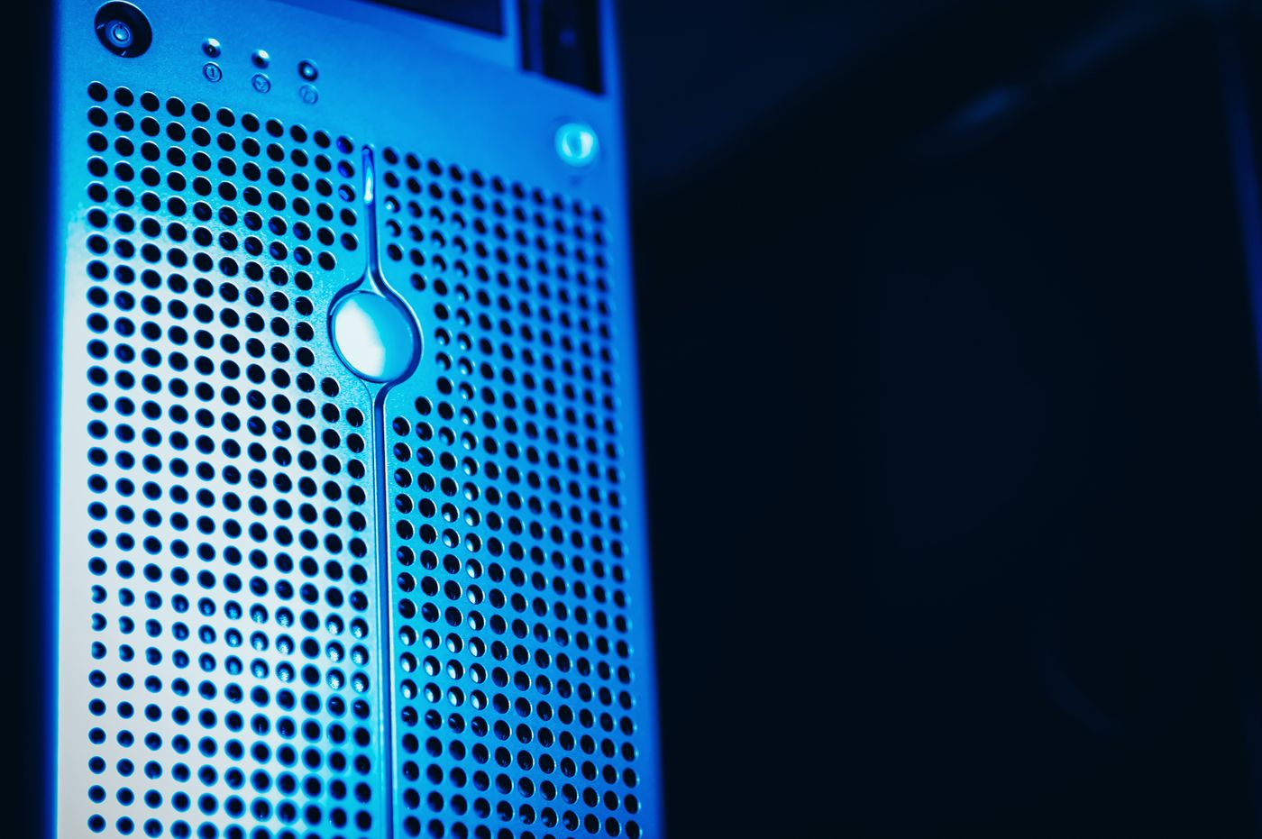 Close-up of a server front panel lit in blue