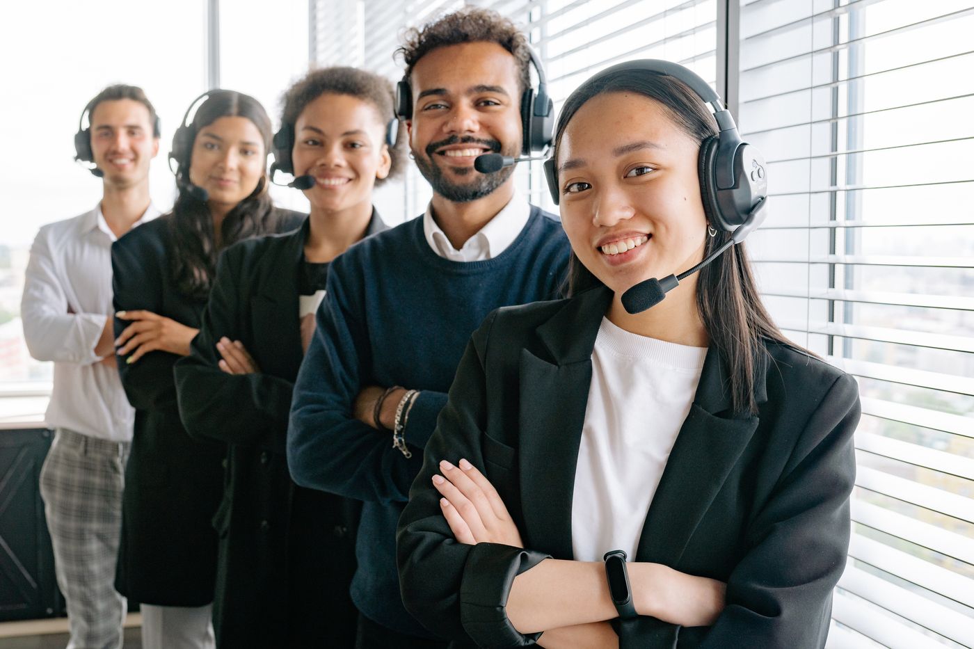 Support team working together at their desks